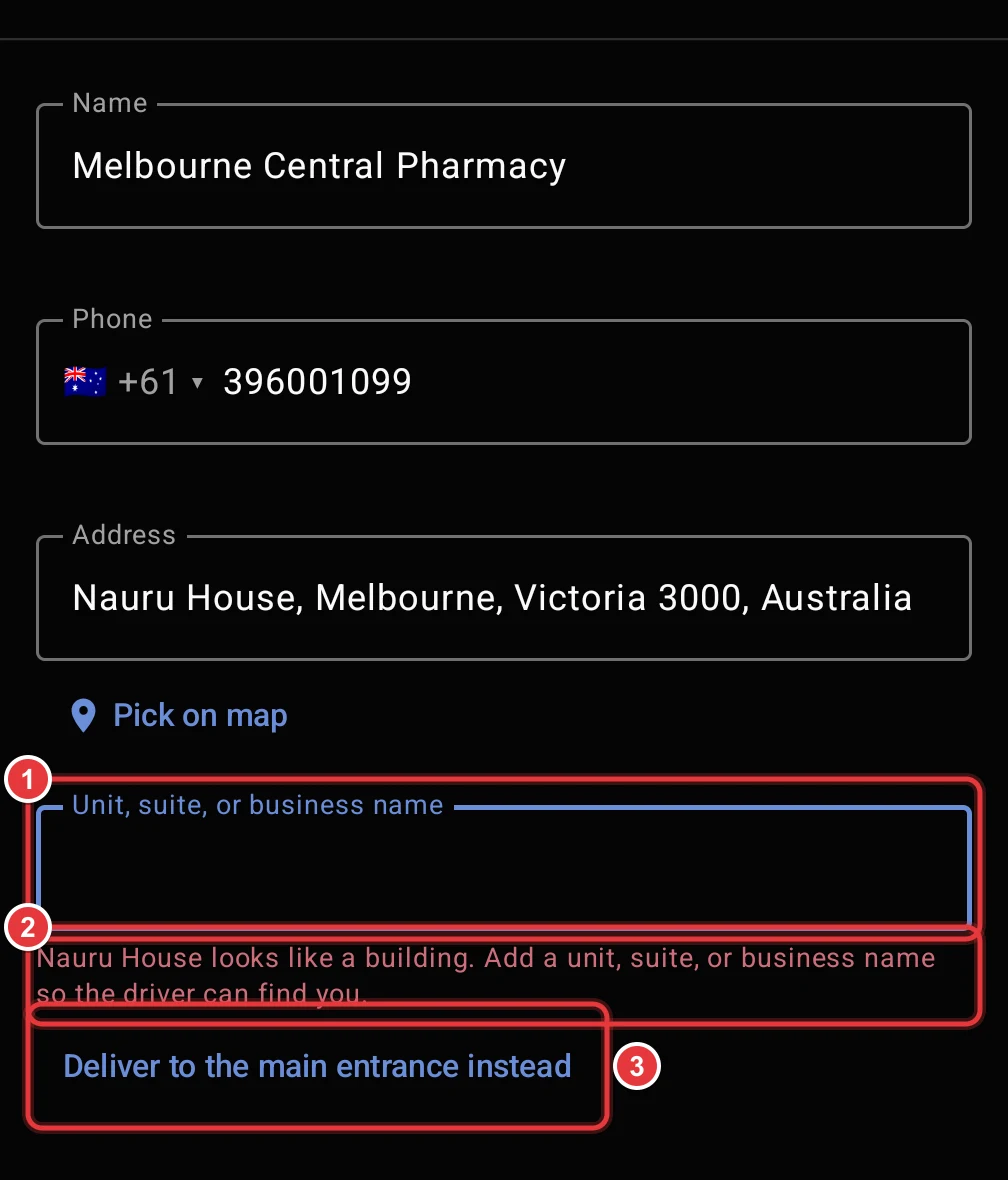 The building warning. The Unit field, the warning text and the Deliver to the main entrance instead link are marked.